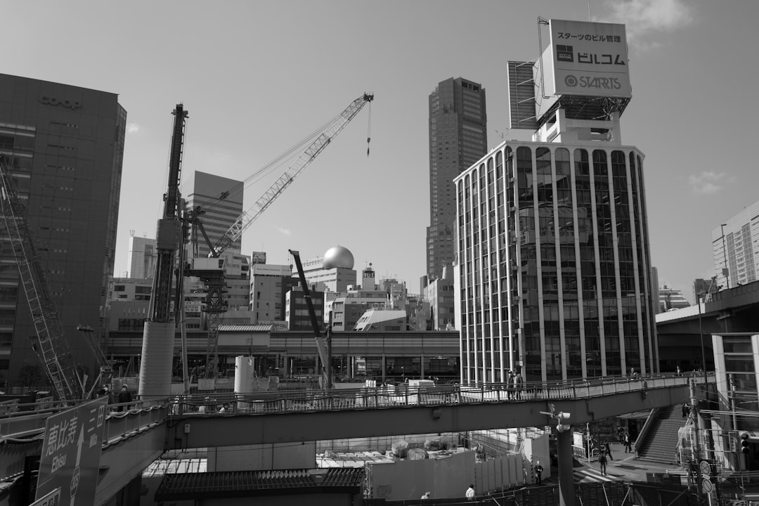 grayscale photo of high-rise building