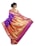 A woman is elegantly draped in a traditional saree with vibrant colors and intricate patterns. The saree features a rich combination of purple and gold with decorative motifs, including peacocks and floral designs. Her hair is styled in an elegant updo, and she accessorizes with earrings.