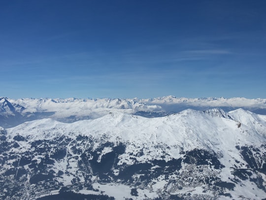 aerial photograph of snow-covered mountain in Lenzerheide Switzerland