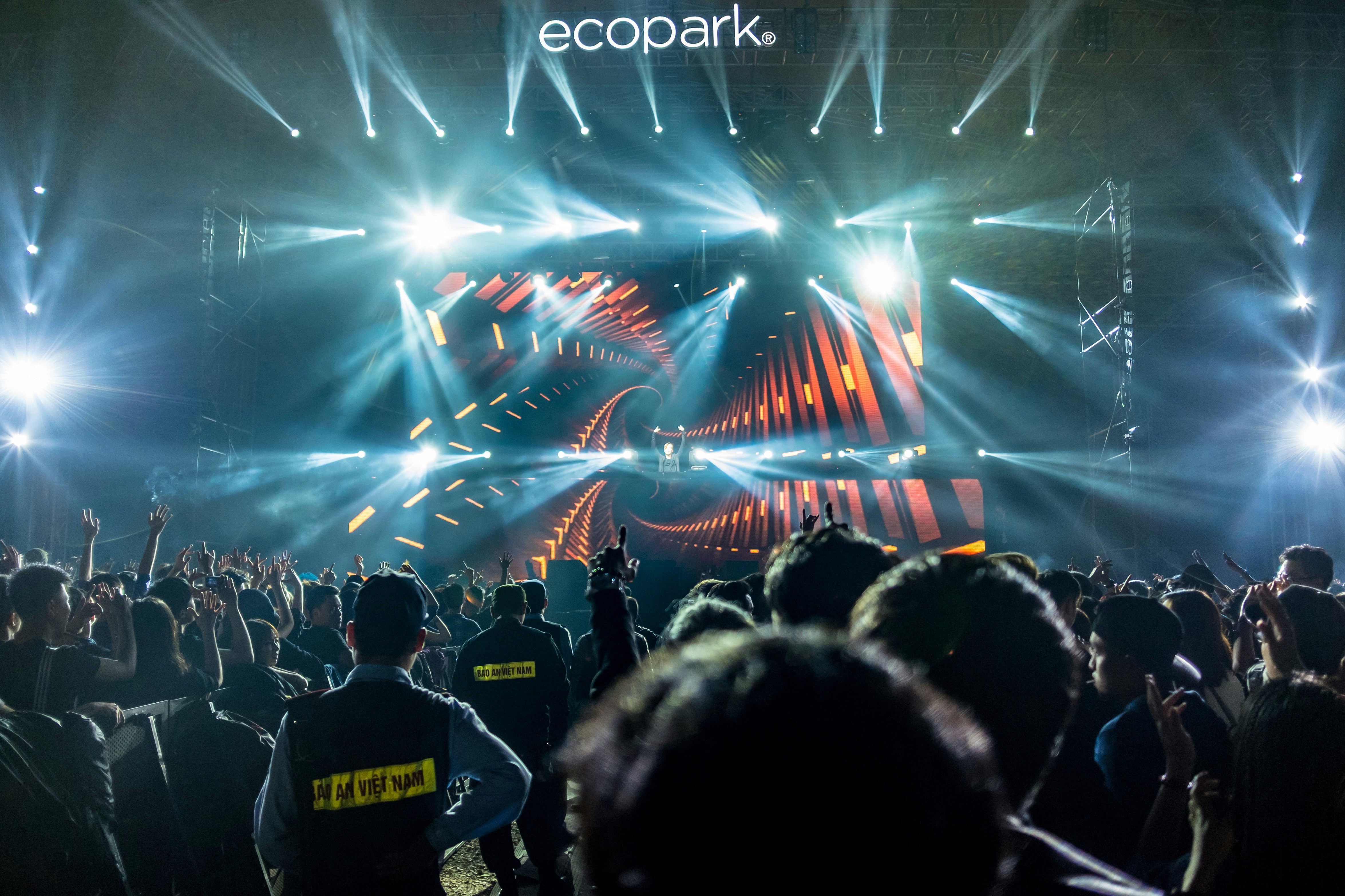 people standing in front of Eco Park stage