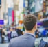 shallow focus photography of man in suit jacket's back