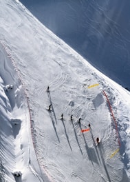 top view of people skating on snow