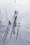 people skiing on snow during daytime
