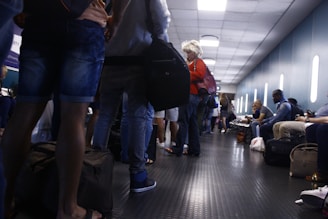 Close-up of safety floor mats installed in a busy airport terminal.