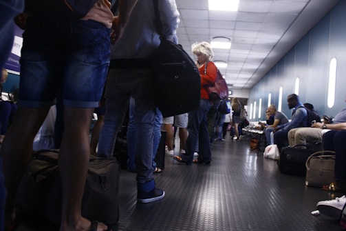 Close-up of safety floor mats installed in a busy airport terminal.
