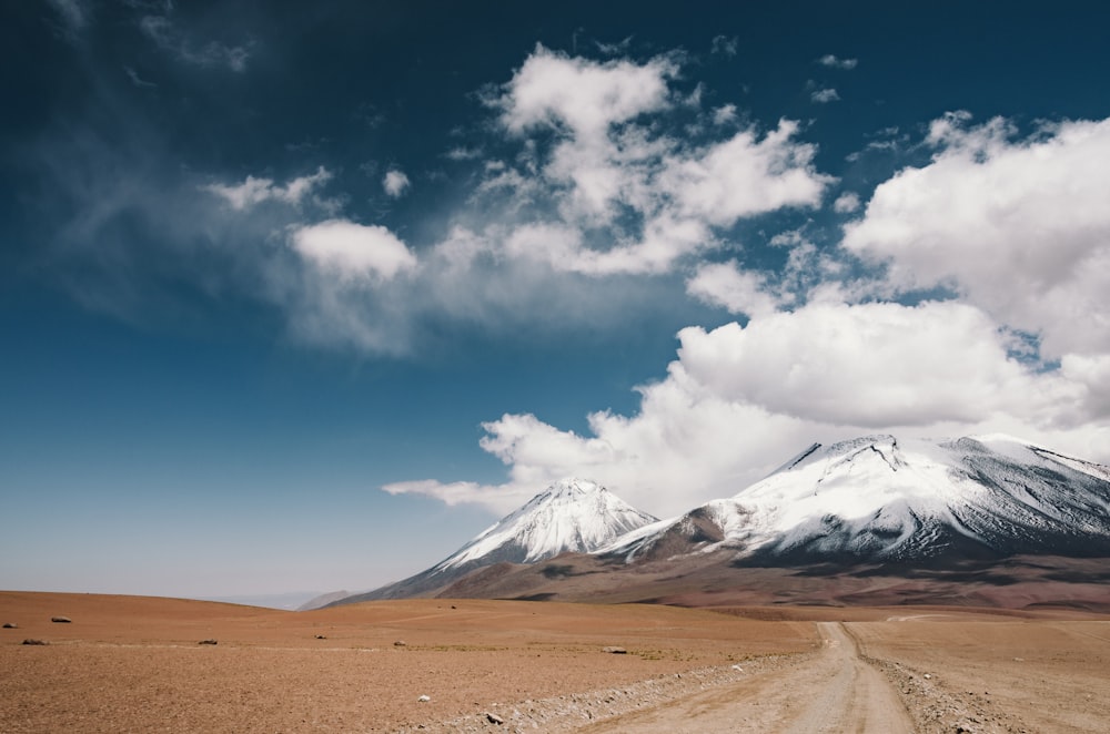 valley near snowy mountain