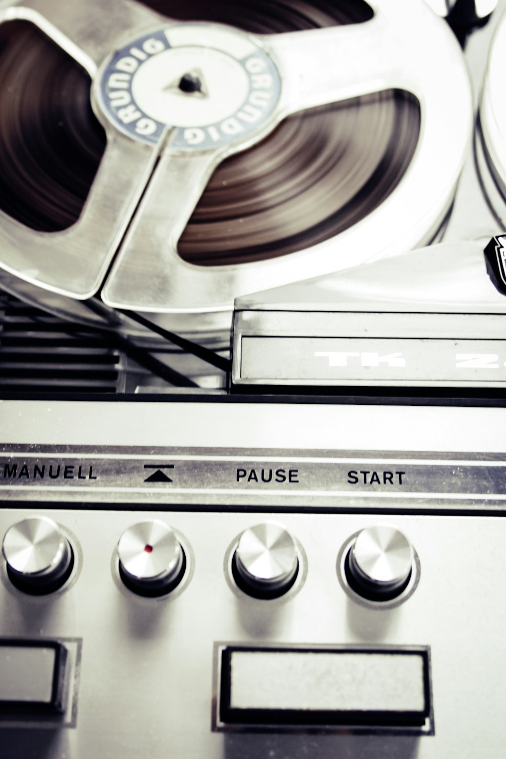 a close up of a reel and a radio