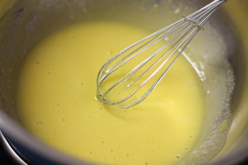 A robotic whisk bot in action, mixing ingredients.
