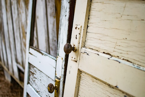 An array of before-and-after images of door restorations.