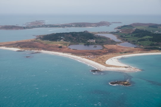 selective focus photography of island during daytime in Isles of Scilly United Kingdom