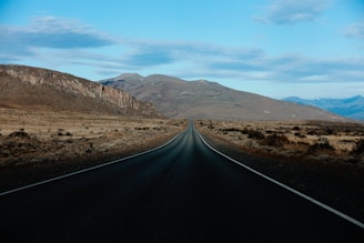 road in the desert during daytime