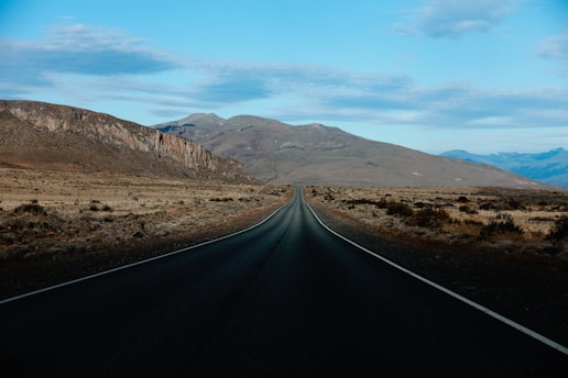 road in the desert during daytime