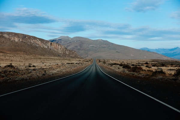road in the desert during daytime