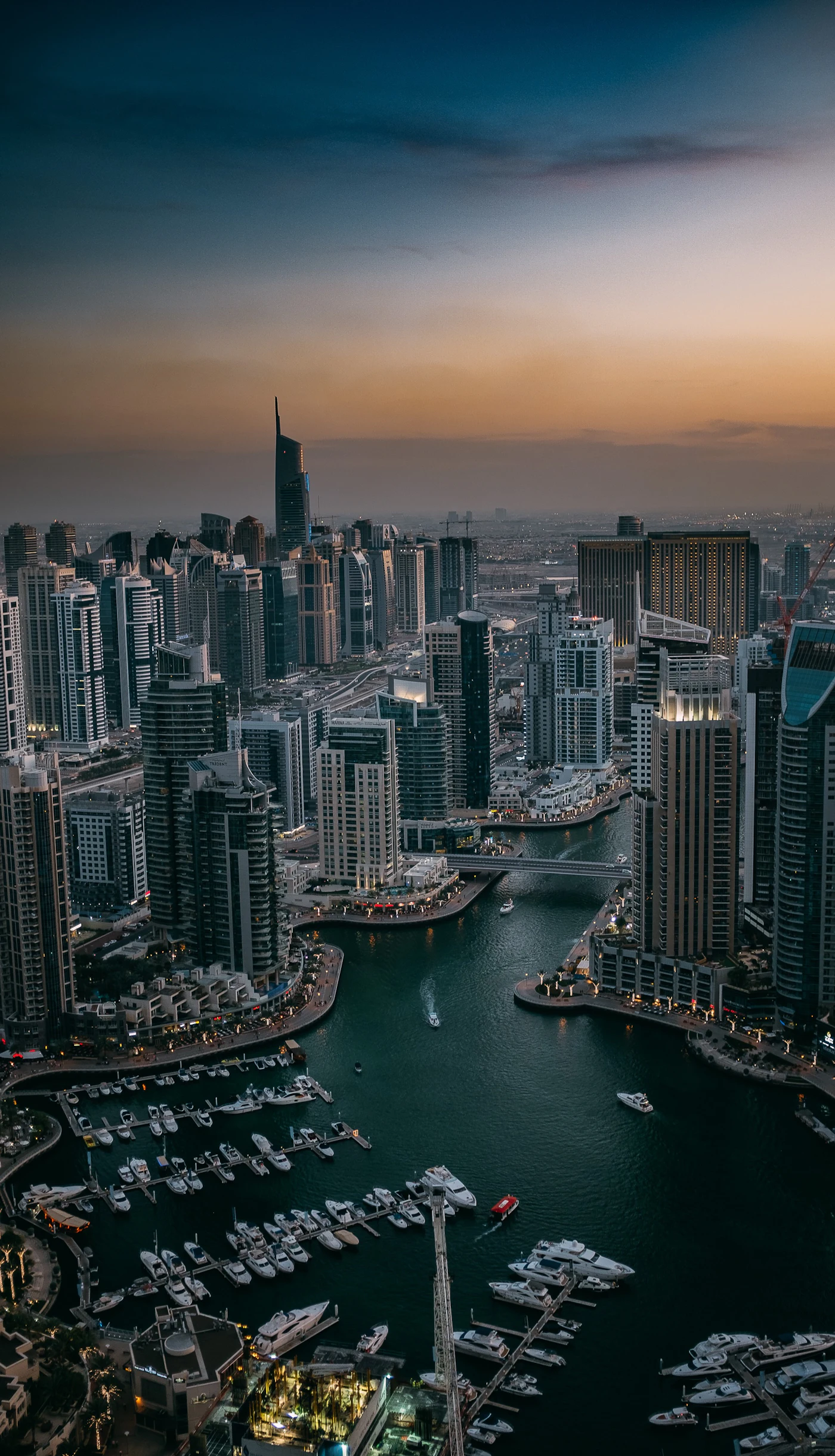 Aerial view over Dubai city buildings during the day