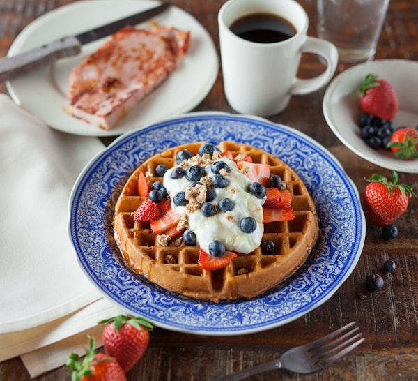 Waffle pancake on blue ceramic plate