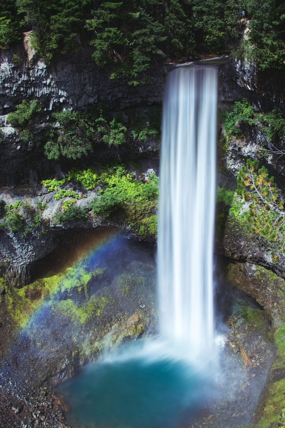 waterfalls at center of mountain
