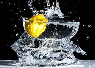 lemon water in footed glass