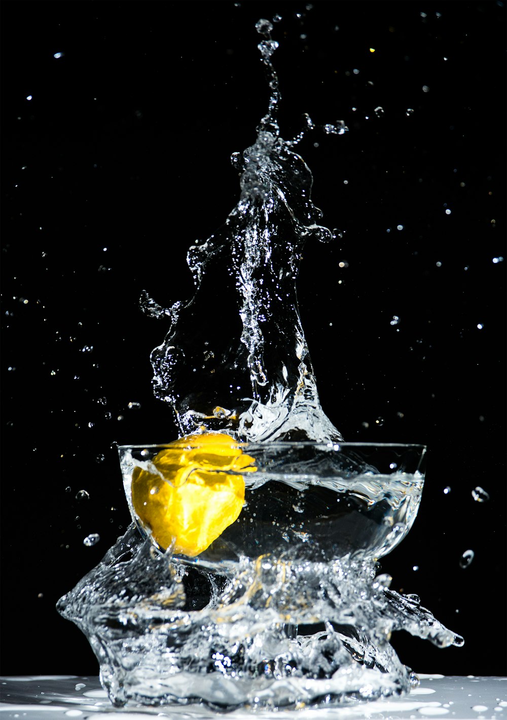 lemon water in footed glass