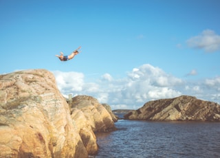 person diving in water