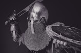 Digital 3D model of a heroic fantasy knight posed with sword and shield.