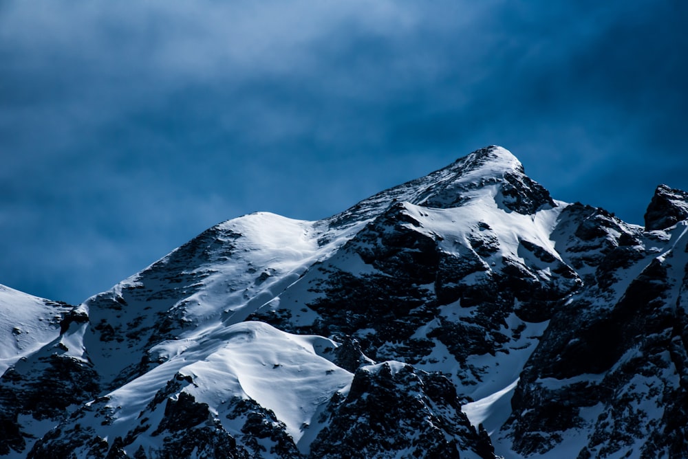 mountain covered by snow