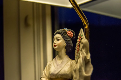 Elegant porcelaincron figurines designed for quinceañera celebrations