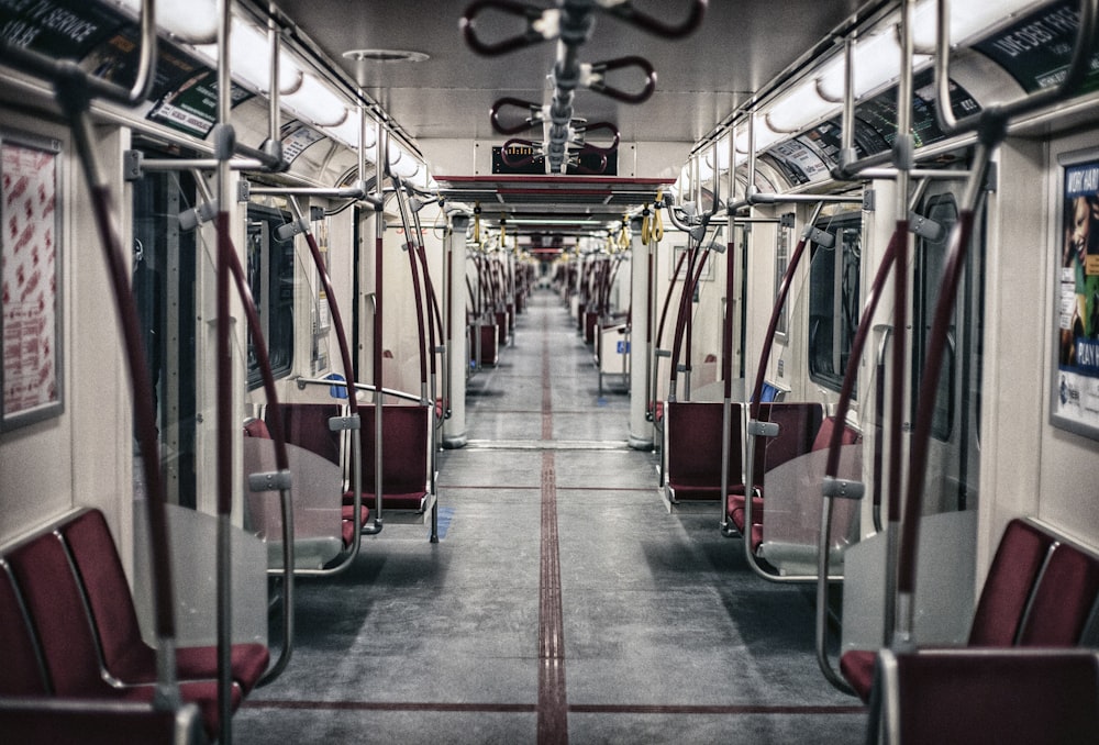 white and red train indoor view