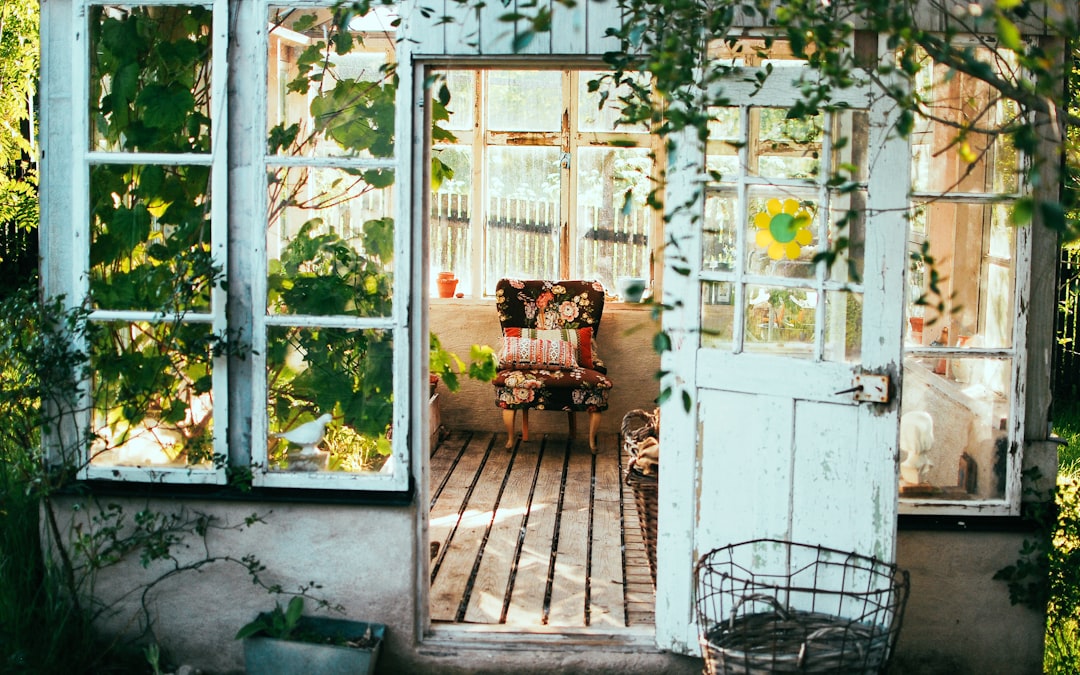 opened door of house, Greenhouse with colorful folding chair Love my work? buy me a coffee ☕ PayPal - a.smit@mac.com