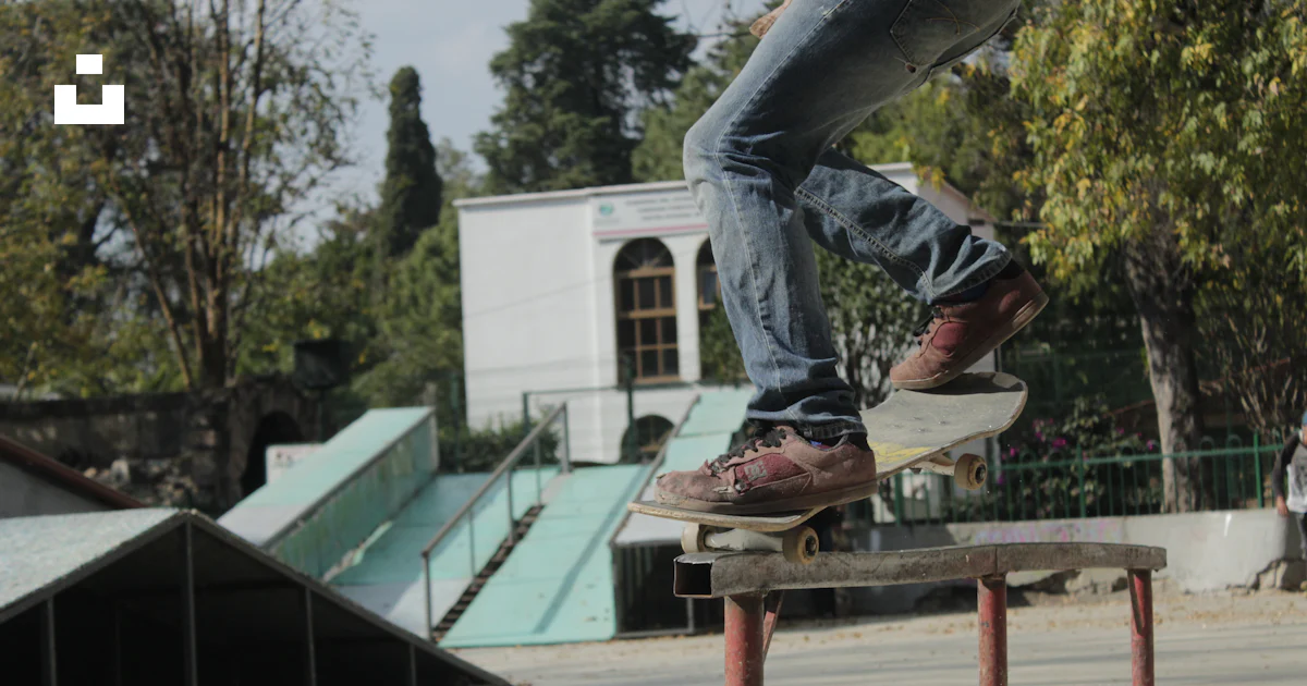 Person skating on rail during daytime photo – Free Man Image on Unsplash