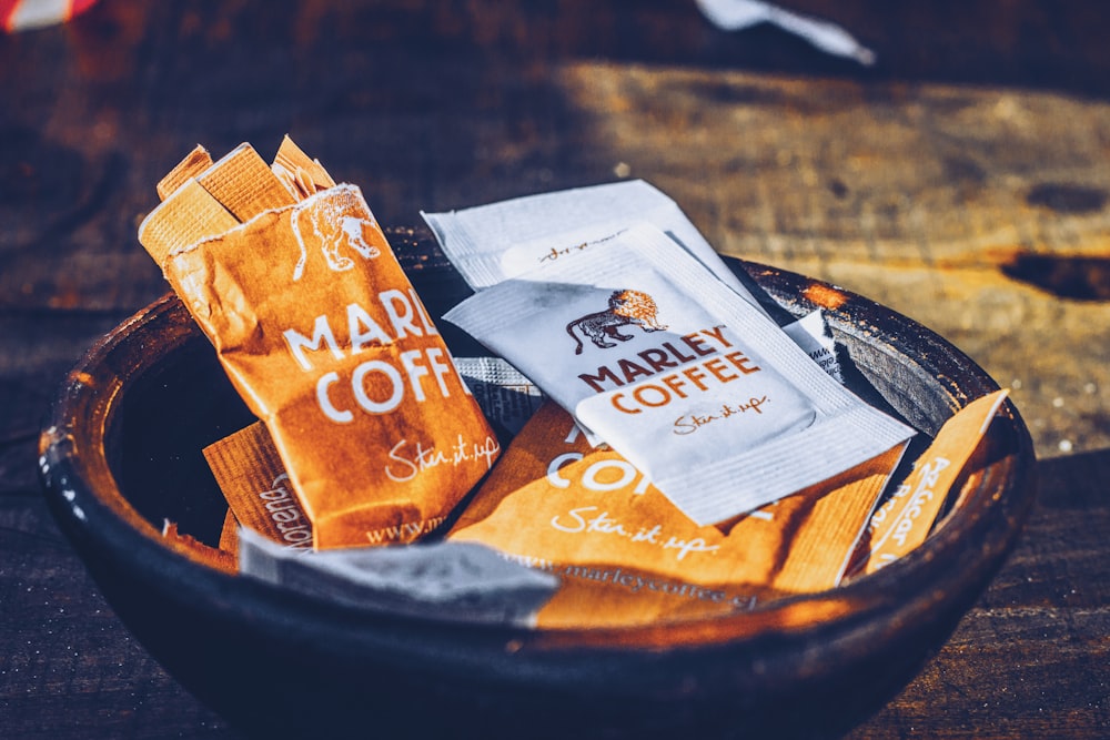 A bowl of Marley Coffee packets.