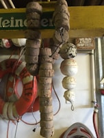 Display of nautical accessories including ropes, life jackets, and anchors in the shop.