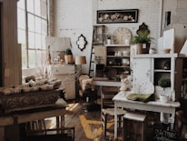 white wooden cabinet near table inside room
