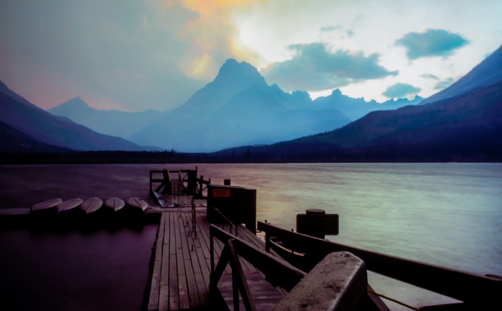 a wooden dock sitting next to a body of water