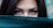 a close up of a person with blue eyes