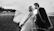 grayscale shot of bride and groom