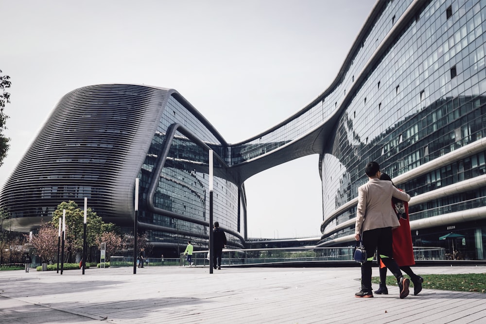 architectural photography of glass windows of conjoined building