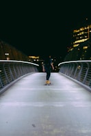 man skating on gray concrete road