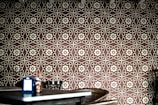 a room with a table and a wall with a pattern on it