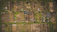 bird's eye view of buildings and grass