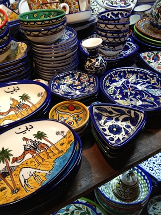 A collection of fine Italian ceramics with golden decorations.