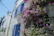 Charming stone facade of Hotel Isla bathed in golden Mediterranean light.