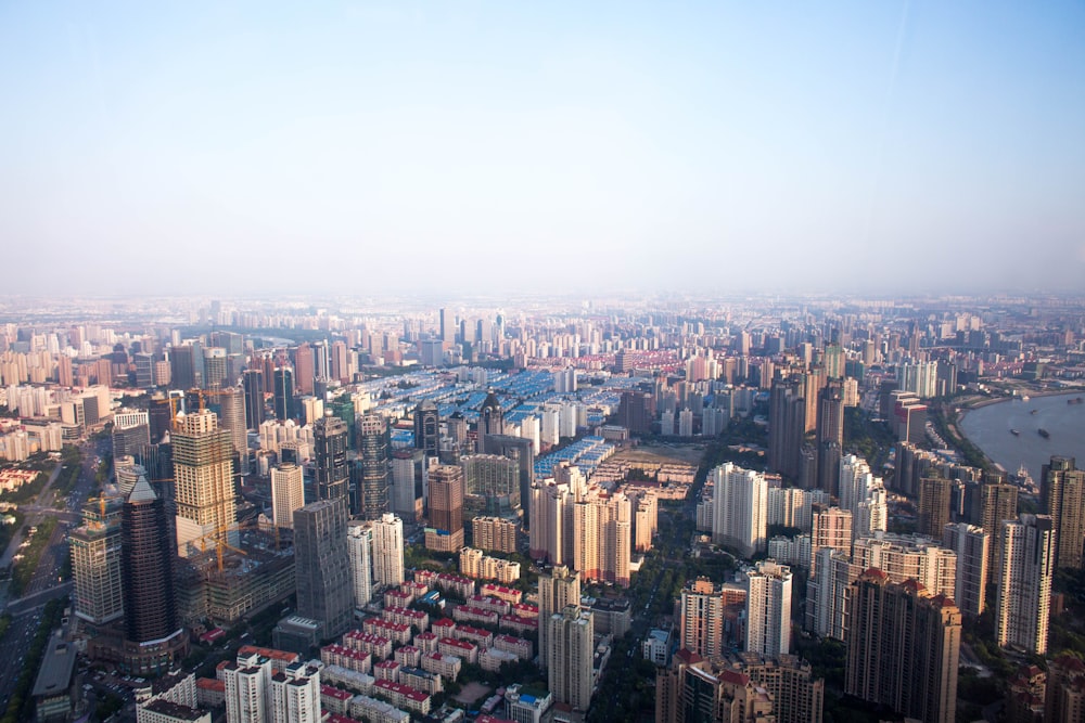 aerial photography of high-rise buildings under cloudy sky