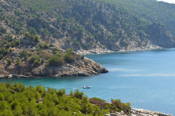A peaceful hidden bay on the island of Rab, with a bike parked nearby, inviting exploration and relaxation.