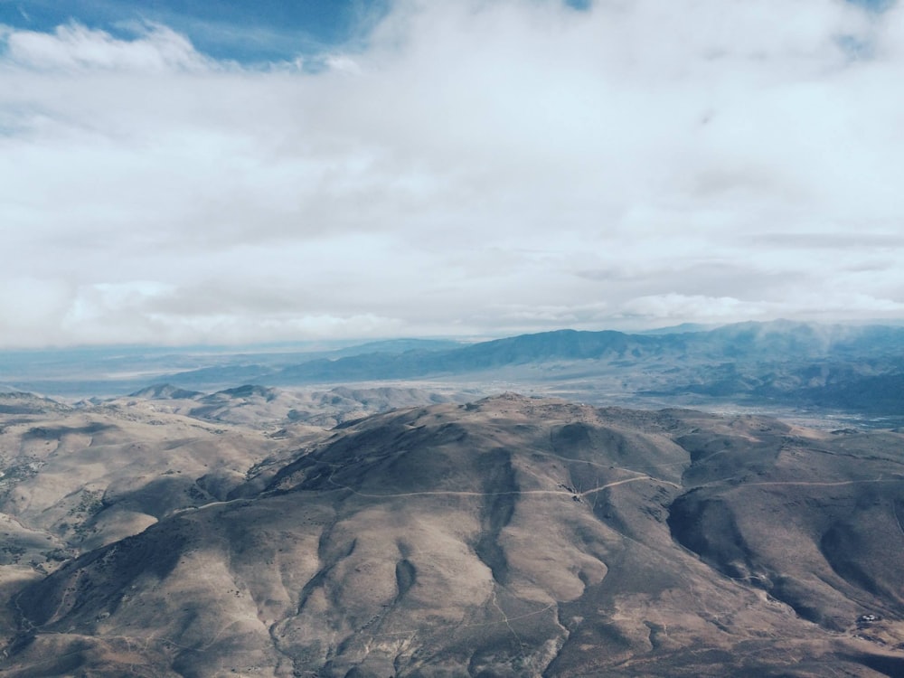 mountains under white cloudy sky