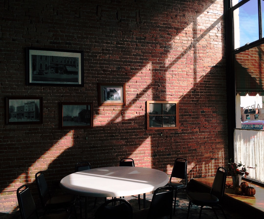 round white table with black chairs