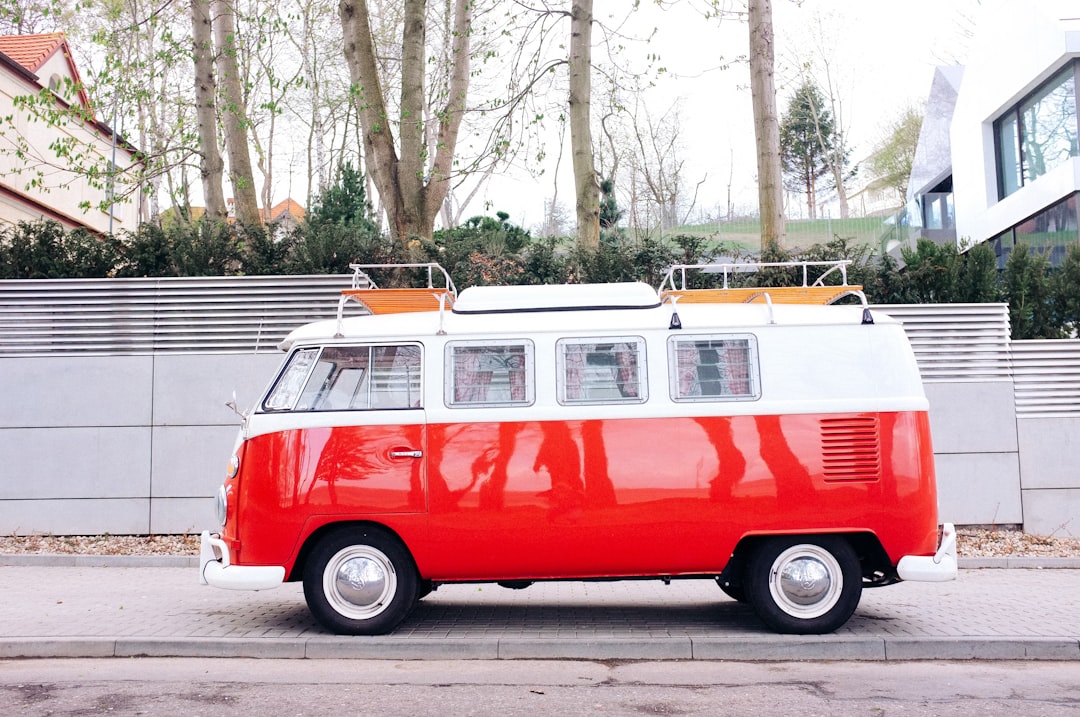 red and white van at the road