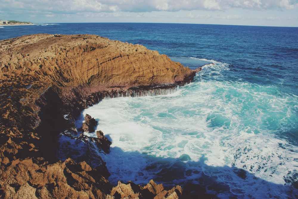 rock formation near body of water