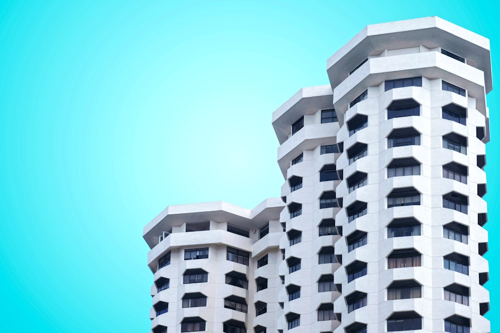 low angle photo of white concrete building