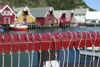 Organized entryway with hooks for boating gear and farmhouse style baskets.