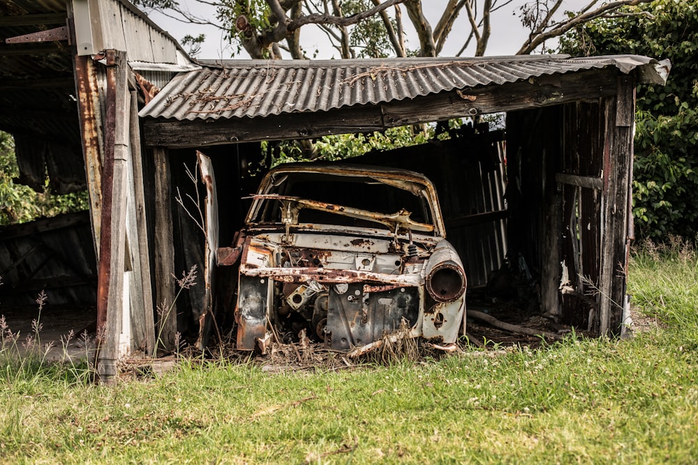 vintage car on garage during daytime